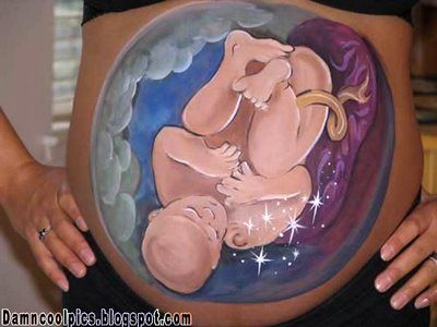 Рисунки на животах беременных (31 фото)